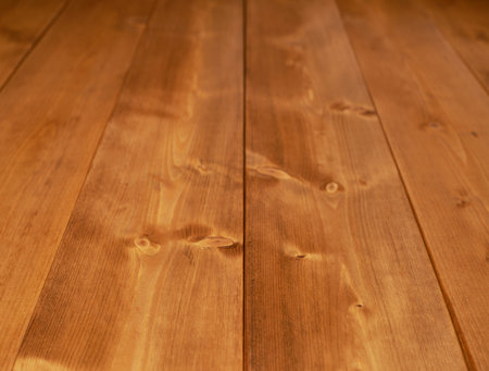 Surface covered with the multiple brown paint coated pine wood boards as a shallow depth of field...