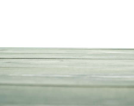 Dark green paint coated wooden pine boards as a copyspace background composition isolated over the white backgroundの写真素材