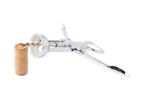 Glossy metal wine bottle opener over the cork plug, composition isolated over the white の写真素材