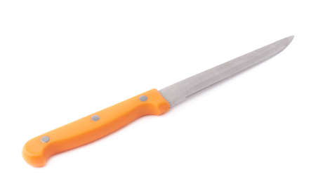 Steel kitchen knife with the orange handle isolated over the white の写真素材