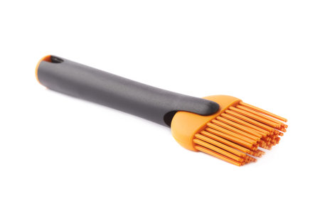 Silicone oil spreading brush for cooking isolated over the white の写真素材