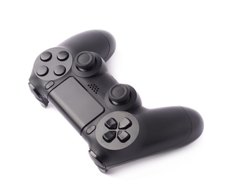 Gaming console black plastic analog controller gamepad device isolated over the white backgroundの写真素材