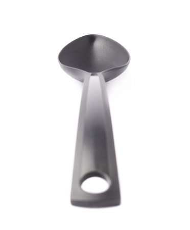 Black plastic kitchen ladle serving spoon isolated over the white の写真素材