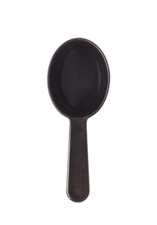 Black plastic measure small spoon isolated over the white の写真素材