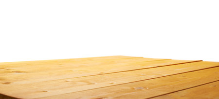 Yellow paint coated wooden pine boards as a copyspace background composition isolated over the white backgroundの写真素材