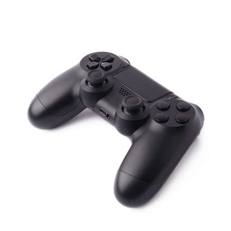 Gaming console black plastic analog controller gamepad device isolated over the white backgroundの写真素材
