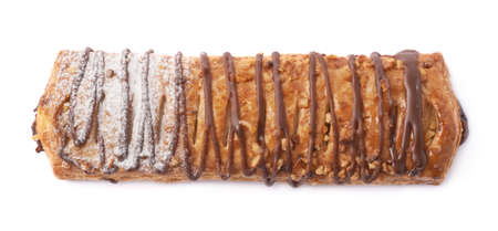 Sweet bread bun pastry filled and covered with chocolate isolated over the white backgroundの写真素材