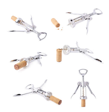 Glossy metal wine bottle opener inside the cork plug, composition isolated over the white backgroundの写真素材