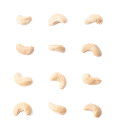 Multiple single cashew nuts seeds isolated over the white background, set of six images, each in two foreshorteningsの写真素材
