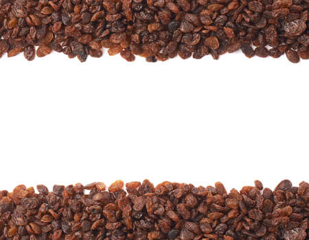 Copyspace background composition with the borders made of multiple raisins isolated over the white backgroundの写真素材