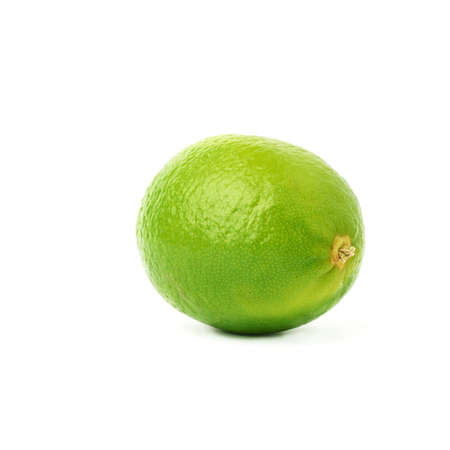 Lime green fruit isolated over the white backgroundの写真素材
