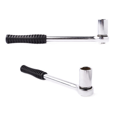 Set of socket metal wrench with black handle over white isolated background, different...