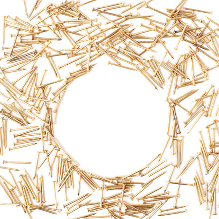 Pile of metal nails isolated over white background