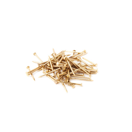 Pile of metal nails isolated over white background