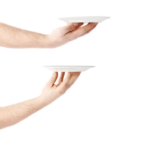 Set of caucasian male hand holding a white ceramic plate, composition isolated over the white backgroundの写真素材