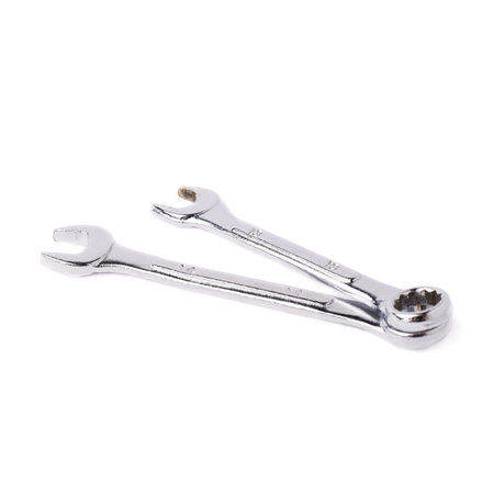 Couple of wrenchs metal spanner instruments isolated over white background