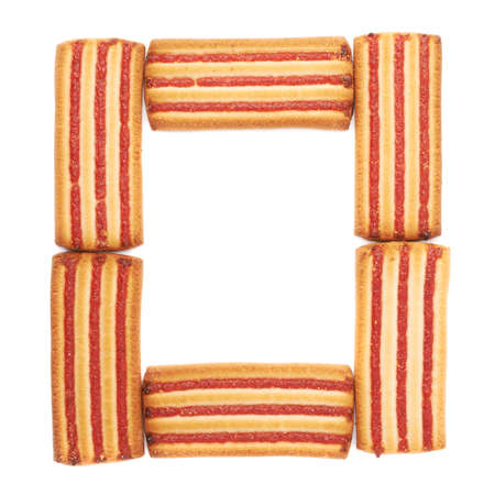 Pile of square cookies with jam stripes isolated over the white backgroundの写真素材