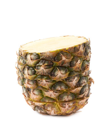 Cut raw fresh pineapple isolated over white backgroundの写真素材