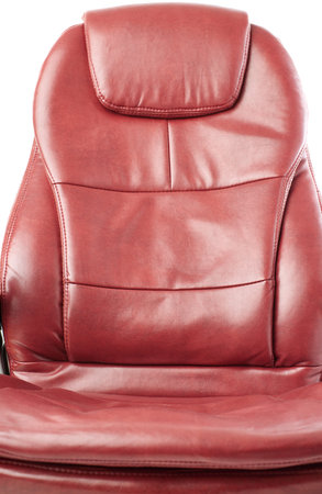 Part of Red leather Office chair over isolated white backgroundの写真素材