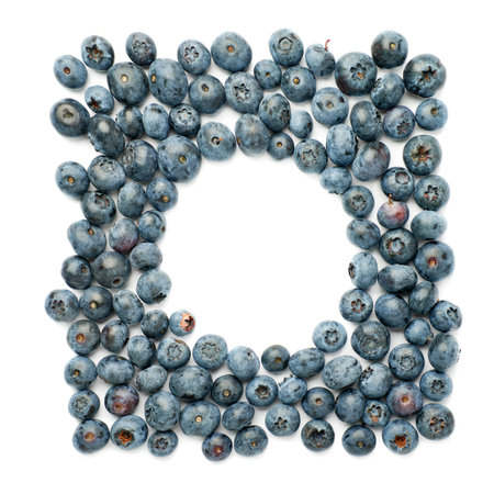 Round frame made of Ripe bilberry or blueberry over isolated white backgroundの写真素材