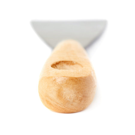 Putty kniFe with wooden handle over isolated white backgroundの写真素材