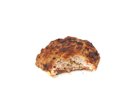 Bitten single prepared small hand made cutlet isolated over white backgroundの写真素材