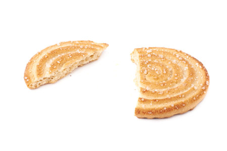 Broken into pieces round cookie isolated over the white background