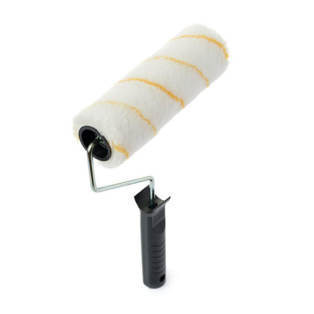 Unused paint roller over isolated white background