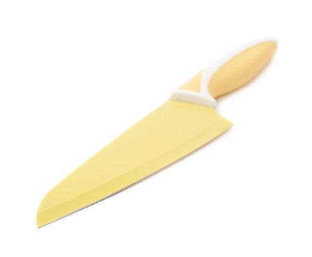 Steel yellow kitchen knife isolated over the white backgroundの写真素材