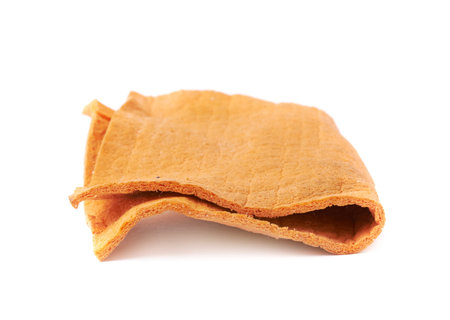 Orange old dried  kitchen cleaning napkin rag over white isolated background