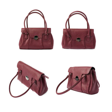 Set of Vinous leather Female bag isolated over the white backgroundの写真素材