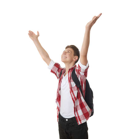 Cute teenager boy in red checkered shirt with school bag, hands uo over white isolated background, half body, as school, education, freeedom conceptの写真素材