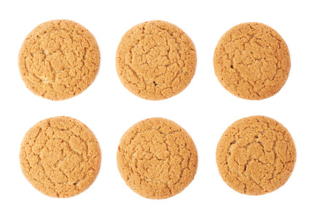 Set of round cookies with the pieces of chocolate isolated over the white backgroundの写真素材