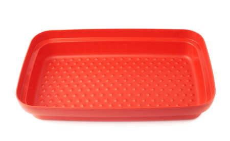 Red plastic tableware food container isolated over the white backgroundの写真素材