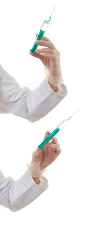 Set of doctor female hand rubber glove with syringe over white isolated backgroundの写真素材