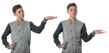 Set of cute teenager boy in gray sweater presenting something on hand over white isolated...