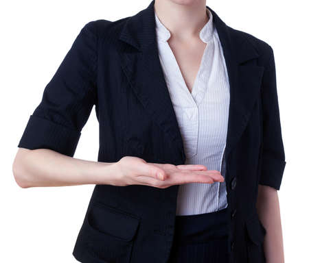 Businesswoman standing over white isolated background holding something, business, education, office conceptの写真素材