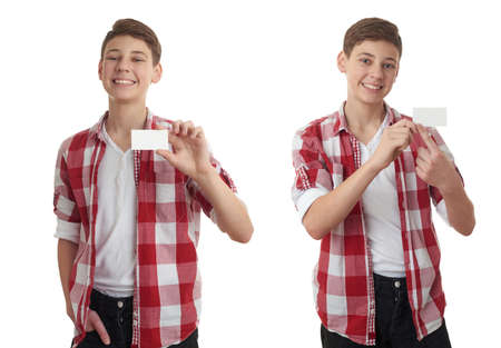 Set of cute teenager boy in red checkered shirt with small paper card over white isolated background, half bodyの写真素材
