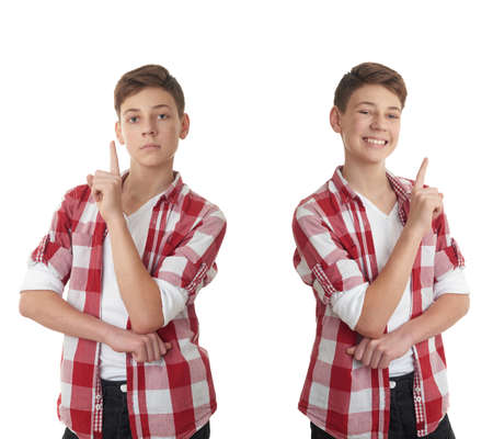 Set of cute teenager boy in red checkered shirt edifying over white isolated background, half bodyの写真素材