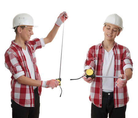 Set of cute teenager boy in red checkered shirt, building helmet and measuring tape over white isolated background, half body, constructing conceptの写真素材