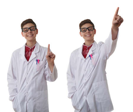 Set of cute teenager boy wearing white lab medic coat and glasses, pointing up over white isolated background as science, medicine, healthcare conceptの写真素材