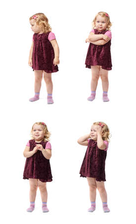 Young little girl with curly hair in purple dress standing over isolated white backgroundの写真素材