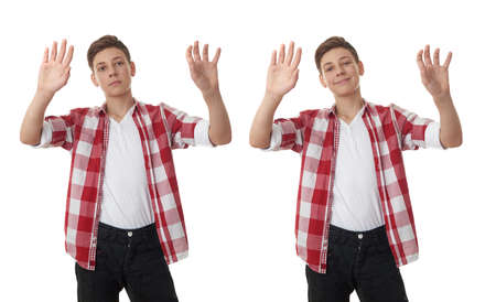 Set of cute teenager boy in red checkered shirt working with virtual screen over white isolated background, half bodyの写真素材