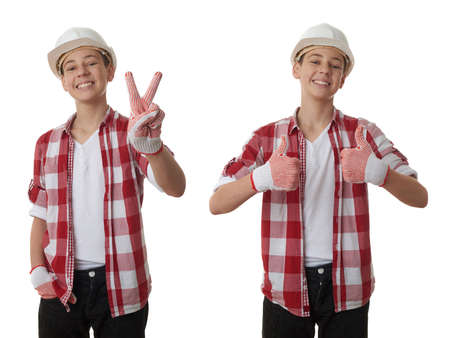 Set of cute teenager boy in red checkered shirt and building helmet showing victory sign over white isolated background, half body, constructing conceptの写真素材