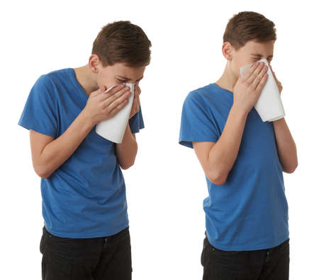Set of cute teenager boy in blue T-shirt with handkerchief over white isolated background, half body, sickness conceptの写真素材
