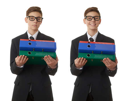 Set of cute teenager boy in back business suit with a pile of folders over white isolated background, half body, future career conceptの写真素材