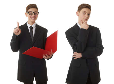 Set of cute teenager boy in back business suit with a red folder over white isolated background, half body, future career conceptの写真素材