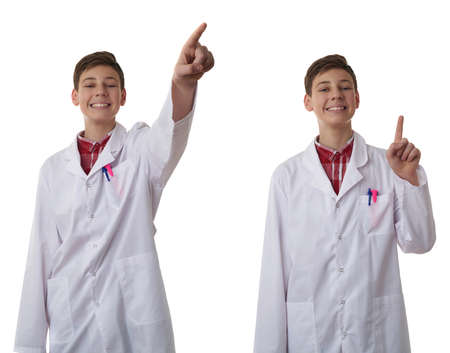 Set of cute teenager boy wearing white lab medic coat pointing up over white isolated background as science, medicine, healthcare conceptの写真素材