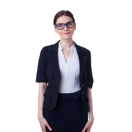 Smiling businesswoman standing over white isolated background in glasses, business, education, office conceptの写真素材
