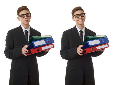 Set of cute teenager boy in back business suit with a pile of folders over white isolated background, half body, future career conceptの写真素材